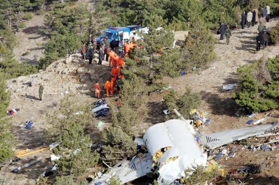 Image: The wreckage of AtlasJet Airline MD-83 lies on the hills near Cukuroren village.