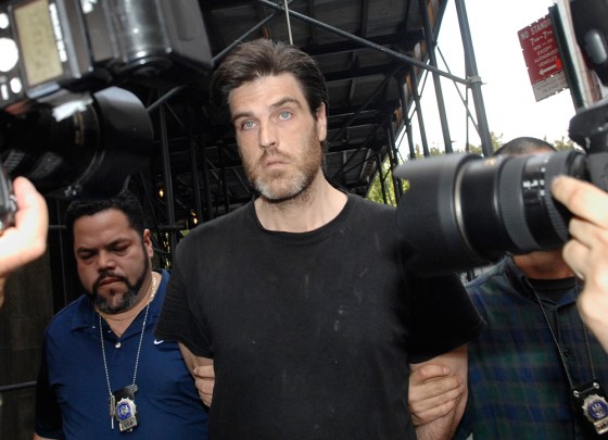 Image: Robert Chambers is led in handcuffs into Manhattan criminal court