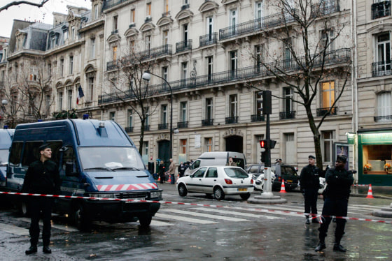 Image: French policemen after a parcel bomb exploded in Paris.
