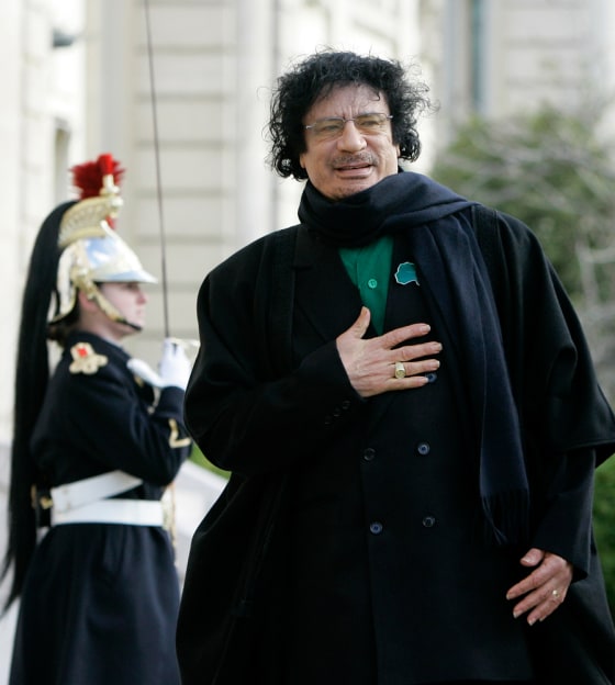 Image: Libyan leader Gaddafi arrives at the National Assembly in Paris