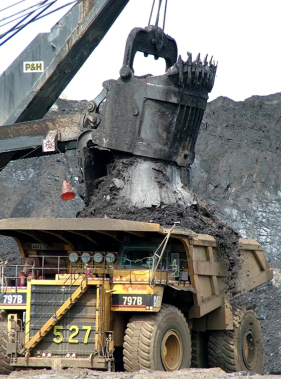 Tar sand deposits are harvested in Alberta for petroleum extraction. Scientists say microbes could convert hard-to-extract oil into natural gas.