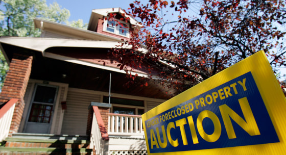 Image: An auction sign is seen in front of a foreclosed home in Shaker Heights, Ohio