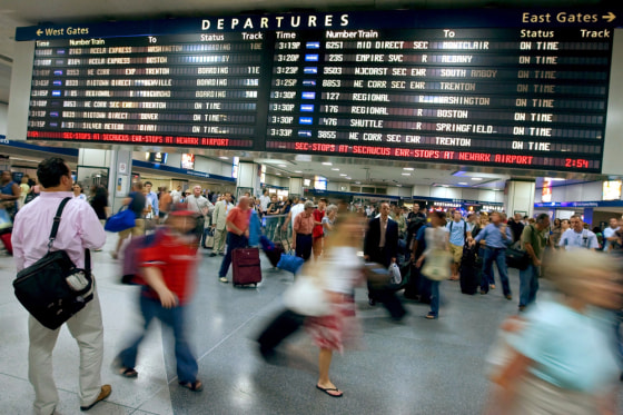 Image: People rush through Pennsylvania Station August 31, 2007 in New York City.