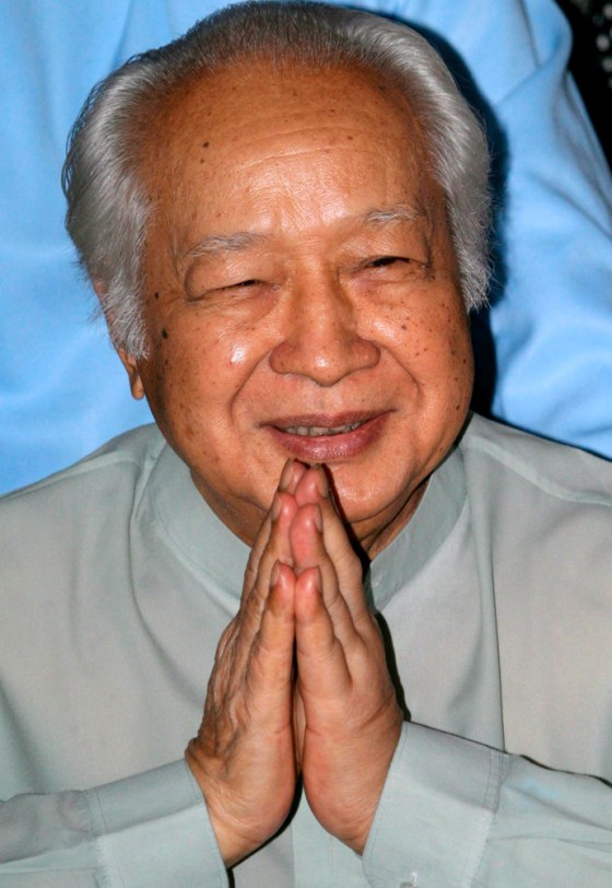 Image: Former Indonesian president Suharto saluting.