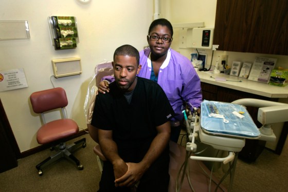 Image: Joi Freemont, DDS and husband Chris Larkin