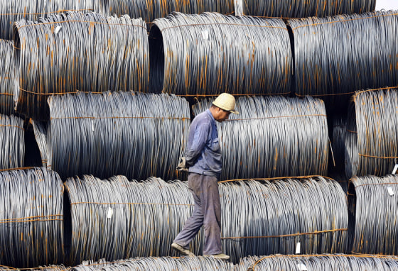 Image: pile of steel at an iron and steel mill yard in Hefei, China
