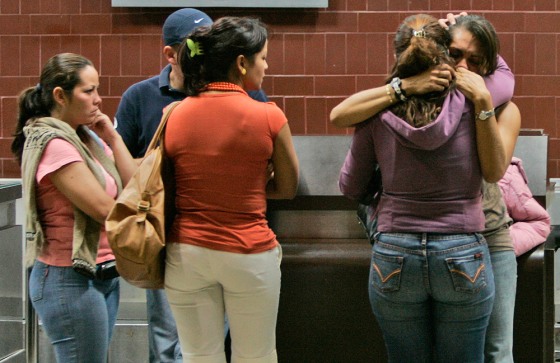 Image: Relatives of passengers on a flight reported missing in Venezuela