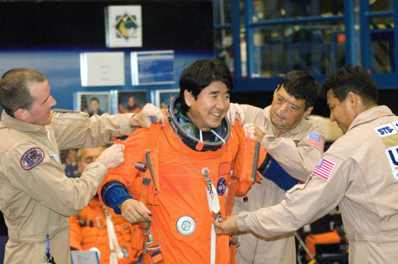 Image: Doi gets dressed