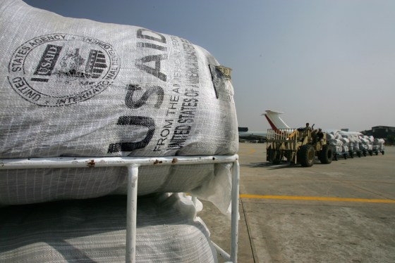 Image: USAID blankets being distributed by Mercy Corps are about to be loaded onto trucks at Chaklala airport.