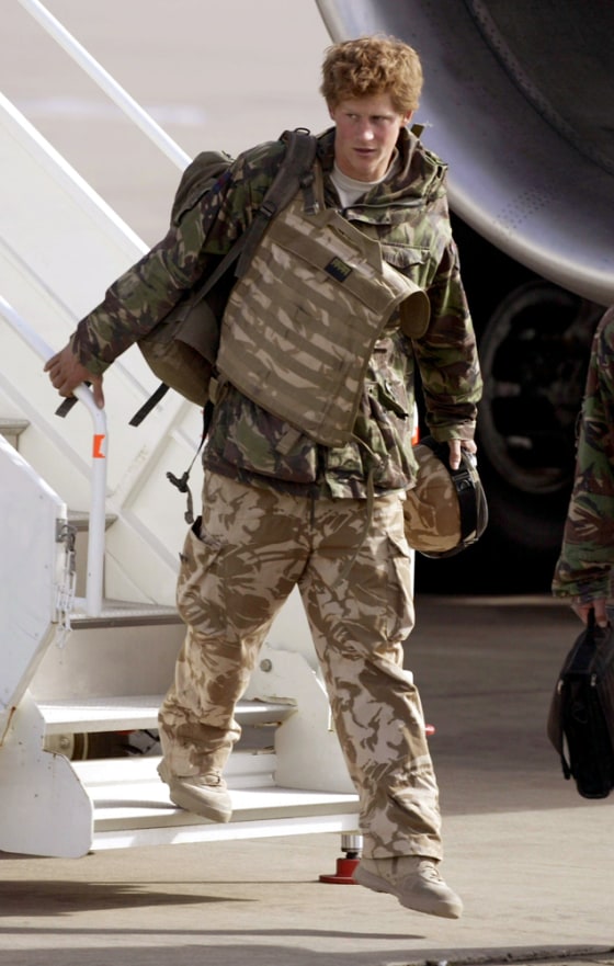 Image: Britain's Prince Harry steps off a plane.