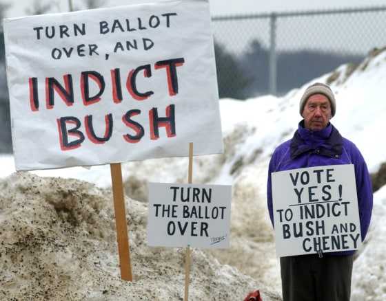 Image: A supporter of idicting President Bush in Brattleboro, Vermont.