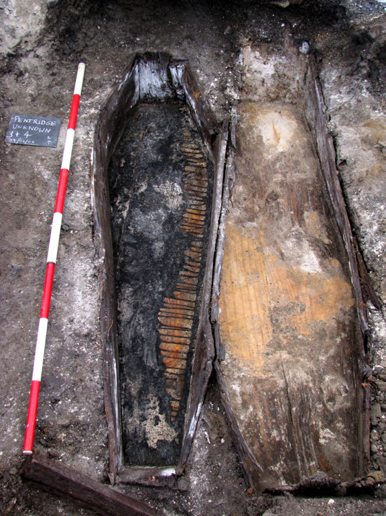 Image: One of the unearthed unmarked coffins, at the former Pentridge Prison site in Melbourne, is seen in this handout photograph