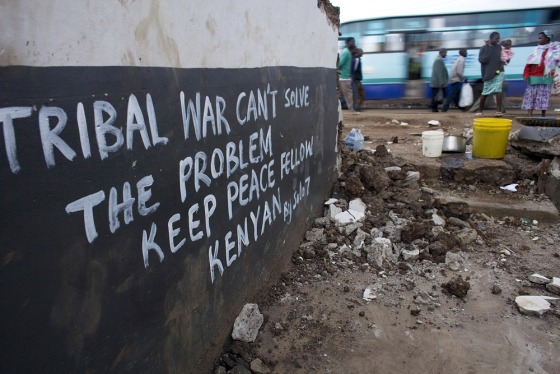 Image: Kenyans head home in the Kibera slums in Nairobi, Kenya