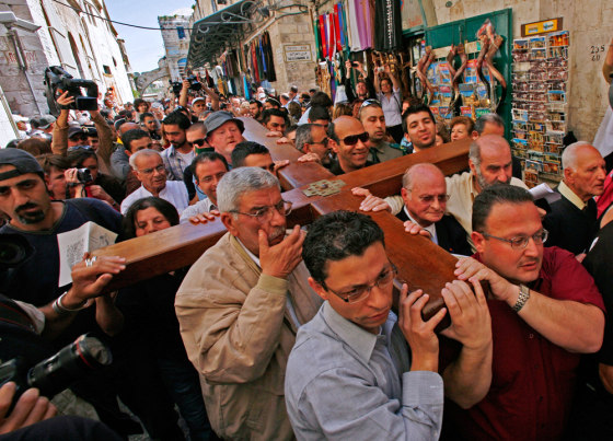 Image: Thousands of Christians from all over the world crowd the stone alleyways of Jerusalem's Old City.