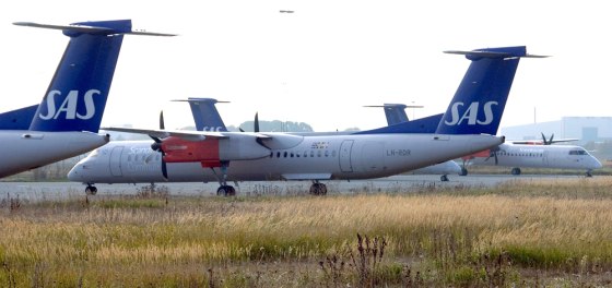 Image: Four Scandinavian Airlines Bombardier Q400 turboprop aircrafts