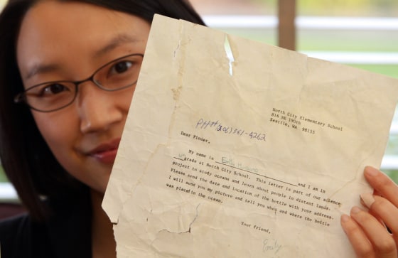 Image: Emily Shih, formerly Emily Hwaung, holds the note sent in a 1987 class project that was recently found in Alaska