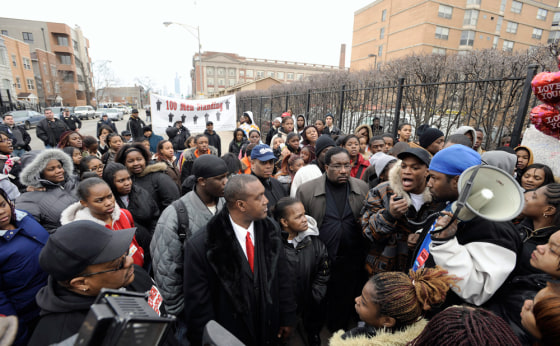 Image: High schools students, friends and supporters at a memorial for a slain student in Chicago.