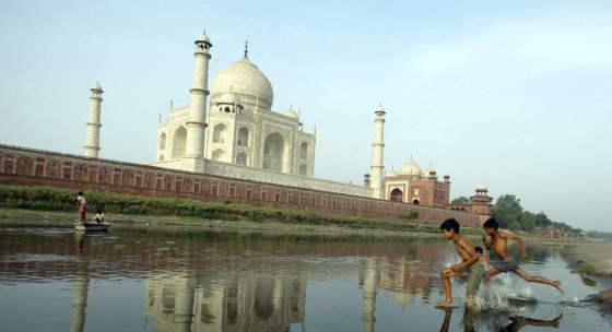 Image: Children play in the Yamuna River behind the Taj Mahal,