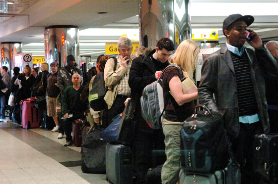 Image: Travelers in line at the American Airlines terminal in LaGuardia