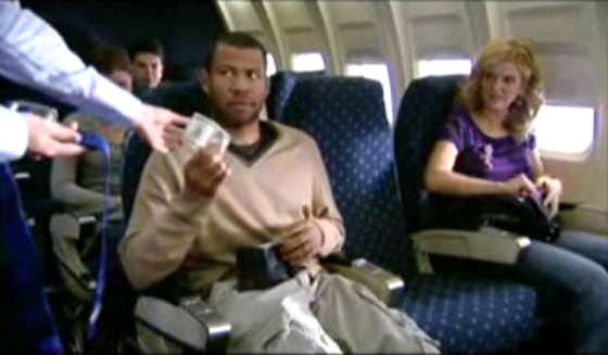 Passengers seem a little concerned about extra flight costs in this image from a Mad TV video.