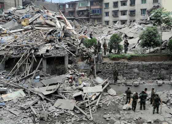 Image: Collapsed building for survivors in Beichuan, southwest China's Sichuan province