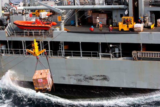 Image: US navy ships awaiting approval to transfer aid supplies to cyclone-struck Myanmar