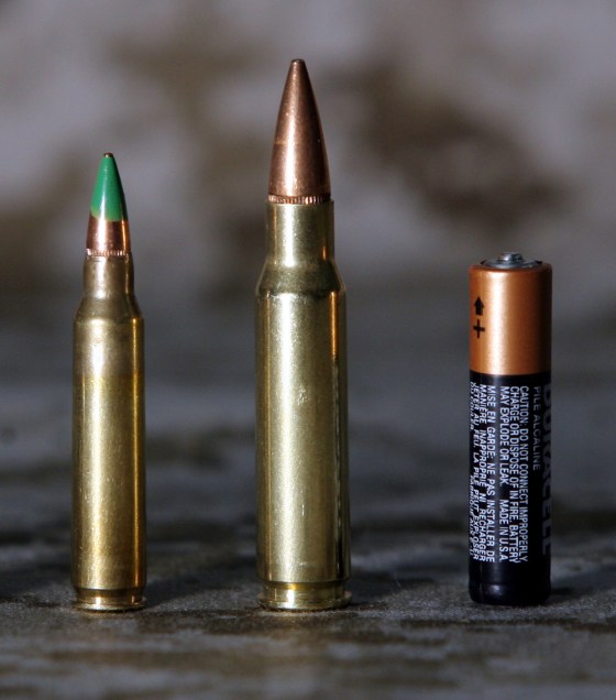 M855 'Green Tip' (left) and M80 bullets are shown next to a standard AAA battery