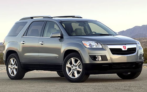 The Saturn Outlook has a second-row seat cushion that flips up while the seatback slides forward for easy third-row access.