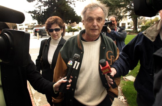 Susan Caudillo, left, sister of murder suspect Scott Peterson, and their father, Lee Peterson, enter the San Mateo Superior Courthouse for pretrial motions Tuesday morning in Redwood City, Calif.