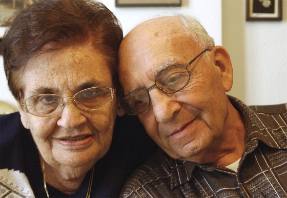 Shoshana November, 73, left, and her brother Binyamin Shilon, 78, right, pose for a photo Monday.