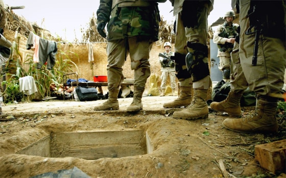 Soldiers Guard Compound Where Saddam Hussein Was Captured