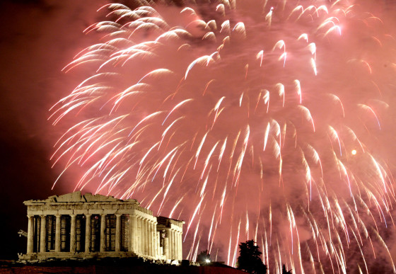 FIREWORKS EXPLODE OVER THE PARTHENON DURING NEW YEARS DAY CELEBRATIONS