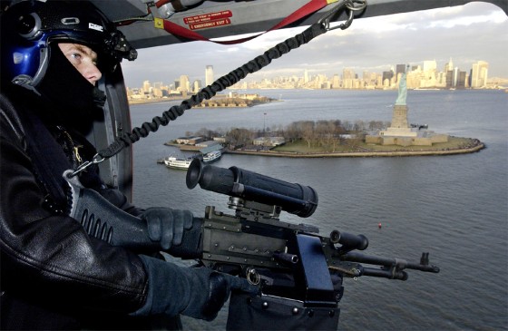 COAST GUARD PATROL OVER STATUE OF LIBERTY IN NEW YORK
