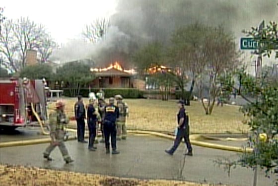 The crash set two houses afire in a suburban neighborhood not far from the airport where the plane took off.