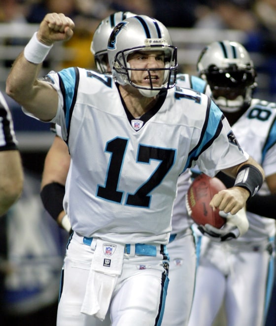 PANTHERS JAKE DELHOMME CELEBRATES A TOUCHDOWN AGAINST RAMS