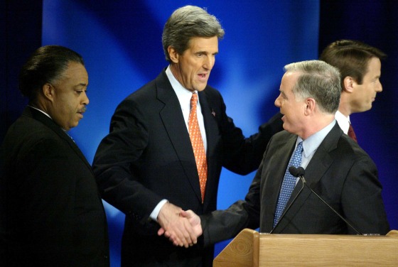 Al Sharpton, left, and John Kerry, center, greet Howard Dean before the debate.