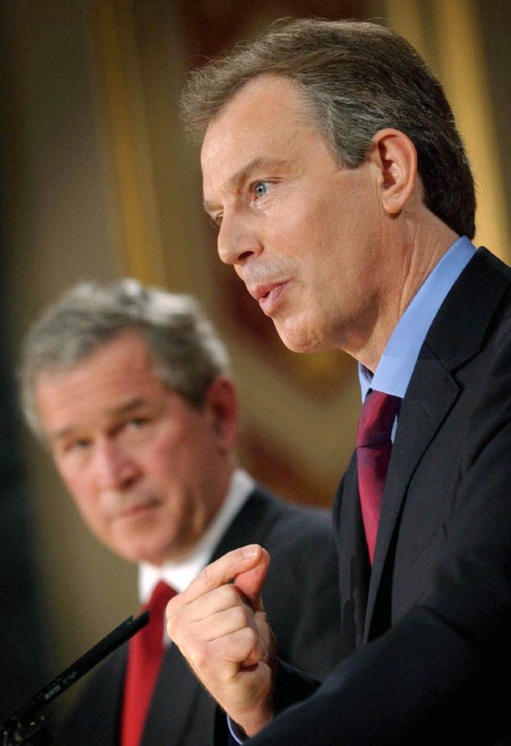PRESIDENT BUSH WATCHES PRIME MINISTER TONY BLAIR SPEAK IN CENTRAL LONDON