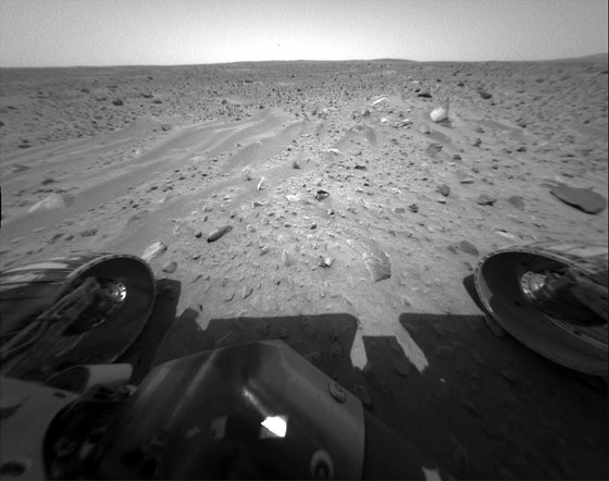 Spirit took this image after completing its record drive. The wavy feature called a bedform is created when material is transported and deposited by some process -- in this case wind.
