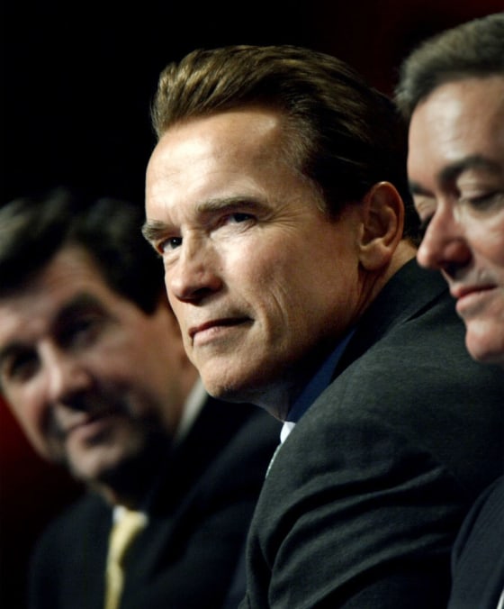 SCHWARZENEGGER LOOKS TOWARD PRESIDENT BUSH AS HE SPEAKS TO GOVERNORS