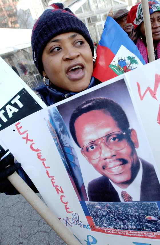 Pro Aristsede Demonstrators Rally In New York City