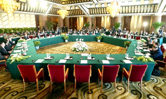 A ROW OF CHAIRS SIT EMPTY AS DELEGATIONS WAIT FOR THE NORTH KOREAN DELEGATION TO ARRIVE IN BEIJING