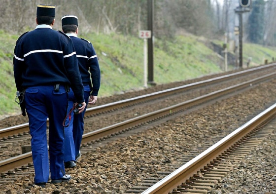 FRENCH GENDARMES PATROL RAIL TRACKS IN SOUTHWESTERN FRANCE AFTER BOMBING ALERT