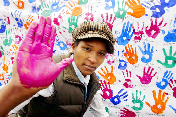 China Keitetsi, a former child soldier from Uganda, takes part in a photo shoot Friday to mark the beginning of Amnesty International's 'Stop Violence Against Women' campaign in London.
