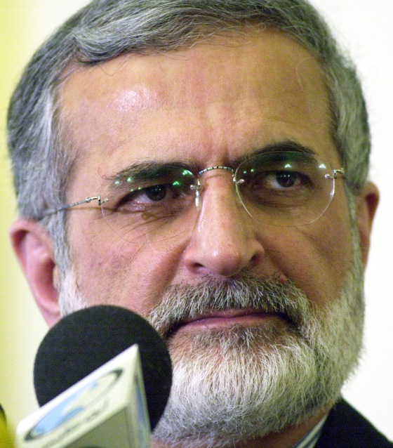 "It's our legitimate right to enrich uranium," Iranian Foreign Minister Kamal Kharrazi, pictured last year, told reporters on Wednesday.