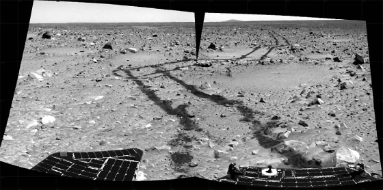 This pair of pieced-together NASA images received Thursday was taken last week by the Mars Spirit rover's rear navigation camera. It reveals the long and rocky path of nearly 240 meters (787 feet) that Spirit had traveled since safely arriving at Gusev Crater in January. The lander can still be seen in the distance, but the rover will never return to it.