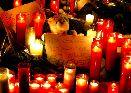 TEDDY BEAR AMID CANDLES PLACED AT SCENE OF MADRID TRAIN BOMBINGS