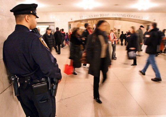 A Port Authority police officer keeps a watchful eye on pedestrian traffic in New York's Grand Central Terminal Thursday.