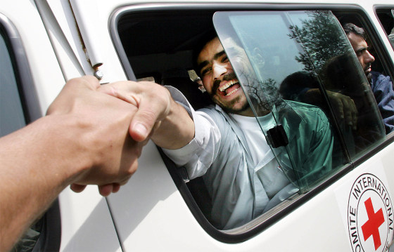 FORMER GUANTANAMO BAY PRISONER SHAKES HANDS