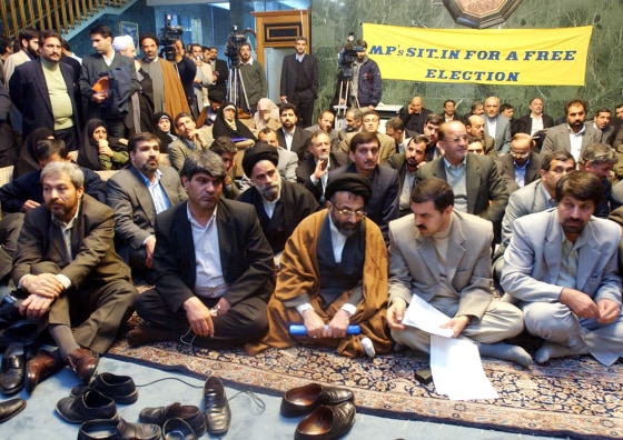 Iranian Interior Minister Abdulvahhab Musavie Lari, first row center with black turban, attends&nbsp;a reformist lawmakers sit-in protest on Jan. 12, after they were disqualified&nbsp;by hard-liners from running in the February legislative elections.