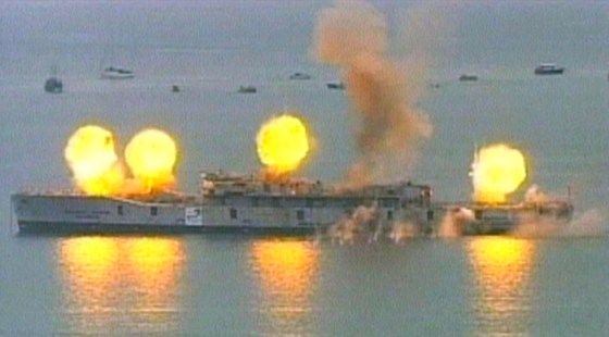 A series of controlled blasts are used to sink the Royal Navy warship Scylla off the coast of southwest England, on Saturday.